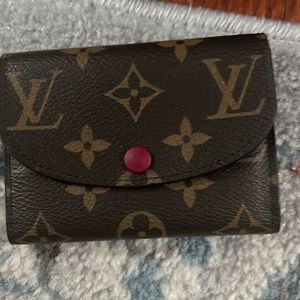 Louie Vuitton coin wallet. Magenta. Dust bag and tags.